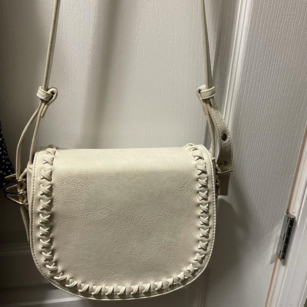 Cream cross body